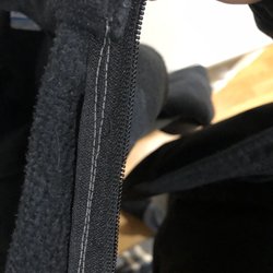 Shoe Luggage Repair and Clothing Alterations - Crooked white thread