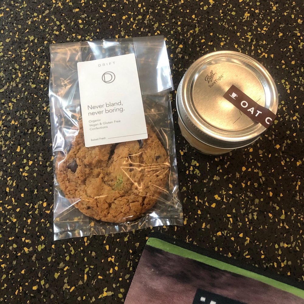 a cookie and a jar on a table