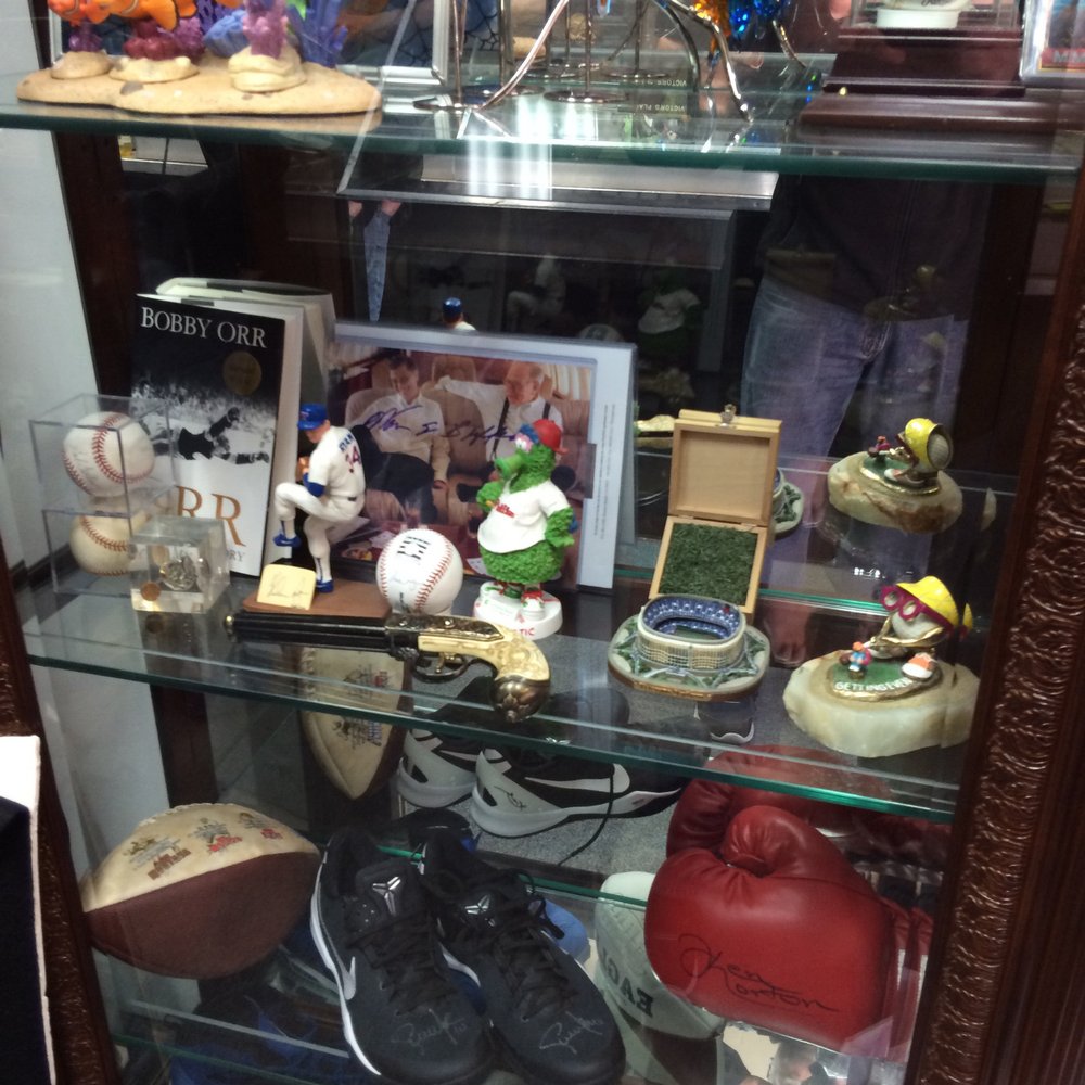 Capo's Coins - Case with signed Baseballs, Footballs, Boxing gloves, check it out! - Gold Buyers Near Me - Philadelphia, Pennsylvania