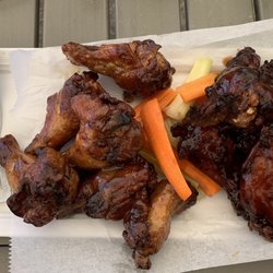 Snorkel's Grill & Bar - Chicken wings-1/2 were Guava BBQ/1/2 were Coconut Ginger Sauce. Big wings-really good. Came with carrots and celery.