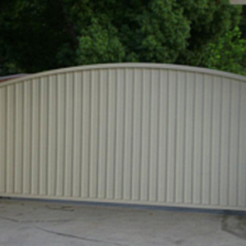 Toos Construction - a driveway gate with a gated entrance - General Contractors Near Me Toos Construction - a driveway gate with a gated entrance - General Contractors Near Me