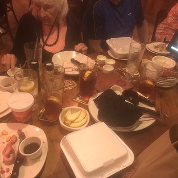 Outback Steakhouse - Smothered in plates , even after the to-go boxes came . - Steakhouses Near Me - Foothill Ranch, California