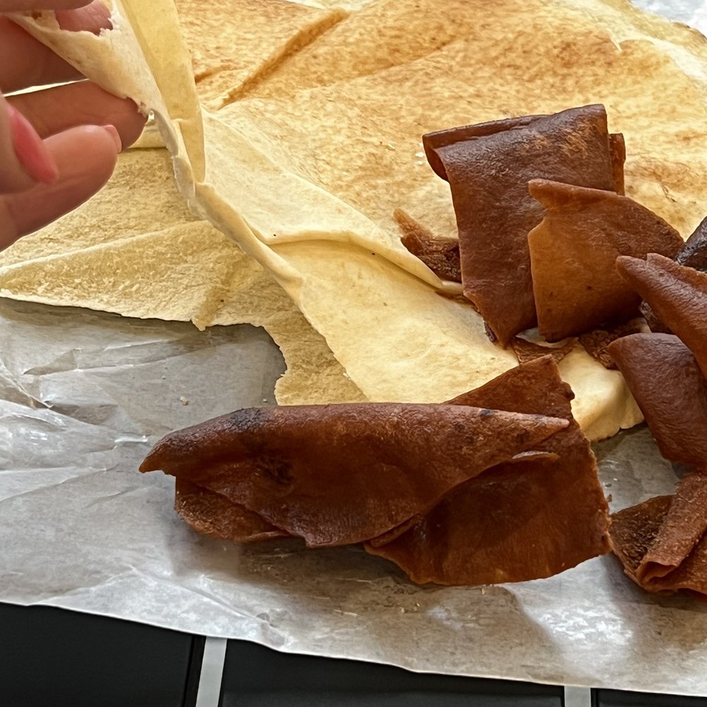 Pita "bread" and burned pita "chips." Pita "bread" and burned pita "chips."