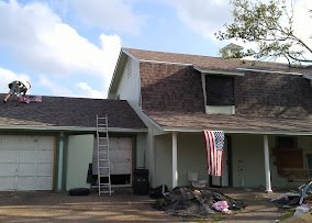 Slide of Lion Roofing