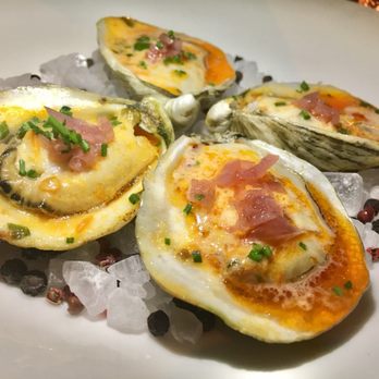Iron Gate - Grilled tangier island oysters w/ goat butter, roasted chili, pickled shallot - New American Near Me - Washington, DC, District of Columbia