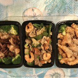 New Canton - Left to right: Honey Walnut Shrimp, Happy Family, and Sesame Chicken