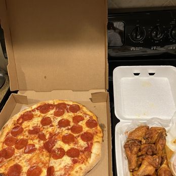 DeRussos Pizzeria - Delicious! The pepperoni slid a little in the Mustang. - Pizza Near Me - St. Petersburg, Florida