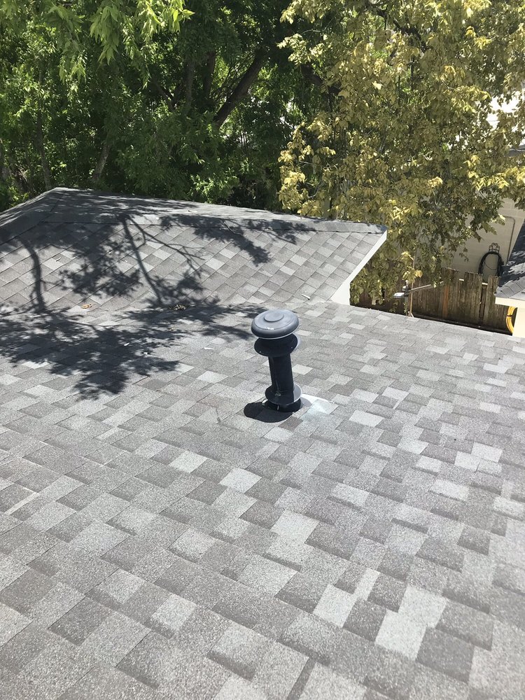 Slide of Houston Heights Roofers