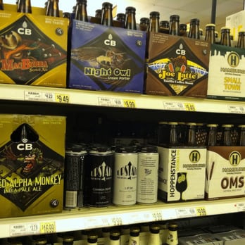 Wegmans - a variety of beer bottles on a shelf - Grocery Near Me - Fairport, New York