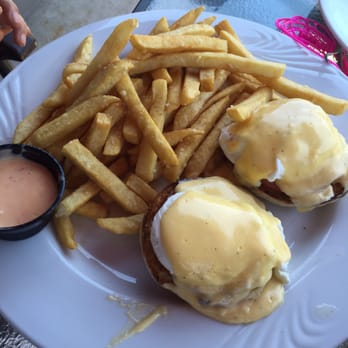 Too Cool Cafe - Eggs Benedict with ham hollandaise sauce and fries. - New American Near Me - Indian Harbour Beach, Florida