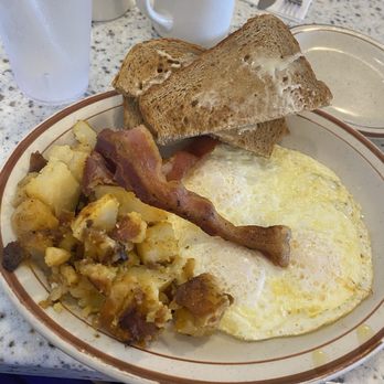 Olympia Flame Diner - Home fries, bacon, whole wheat toast, and over easy eggs - Diners Near Me - Deerfield Beach, Florida Olympia Flame Diner - Home fries, bacon, whole wheat toast, and over easy eggs - Diners Near Me - Deerfield Beach, Florida
