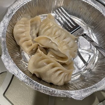 Momo n Curry - Steamed chicken momo (after we dug in). Comes with 8 pieces. - Himalayan/Nepalese Near Me - Fremont, California