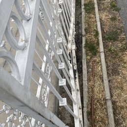 The bent gate, bent back enough to slide into place again The bent gate, bent back enough to slide into place again