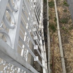 Hernandez Towing & Auto Body - The bent gate, bent back enough to slide into place again