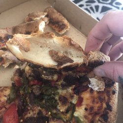 Domino’s - The crust was so burned that it was hollow and snapped upon being picked up!