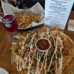 Loaded nachos with added chicken and an Order of truffle fries.. cases tithe a witch buutner dark stout, coffee stout next. Loaded nachos with added chicken and an Order of truffle fries.. cases tithe a witch buutner dark stout, coffee stout next.