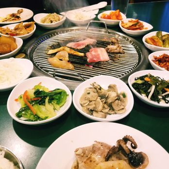 Mama's House - Pork Belly & Seafood combo (jumbo shrimp/squid/octopus) comes w/ 12 different veggie sides to add to your rice or to make lettuce wraps. - Korean Near Me - Indianapolis, Indiana