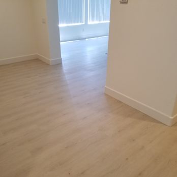 Unique Flooring - Patina Designs Museum Warhol Luxury Vinyl Planking (26 mil pattern thickness). 5 inch plus radiused top baseboard. - Flooring Near Me - Oceanside, California