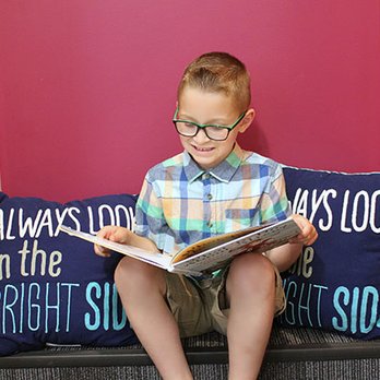 Smile Zone - Kids love our reading corner! It has the perfect view of our fish tank as well. - Pediatric Dentists Near Me - Springfield, Missouri Smile Zone - Kids love our reading corner! It has the perfect view of our fish tank as well. - Pediatric Dentists Near Me - Springfield, Missouri