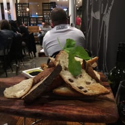 Mixed bread with balsamic and crumbed olives