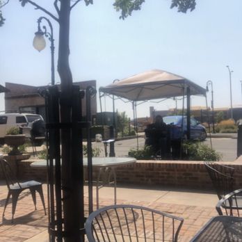 Blacksmith Square - a view of a patio with tables and chairs - Beer, Wine & Spirits Near Me - Livermore, California