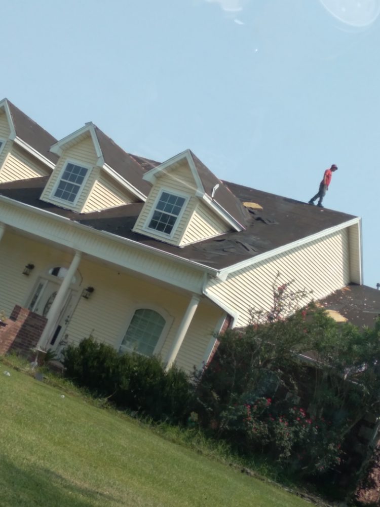 Slide of J&K Roofing Company