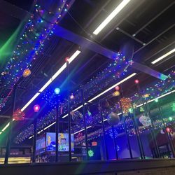 Fred's Garage - Watching the game while at our table.