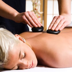 Hideaway Massage - Enjoy a hot stone massage at Hideaway Massage.