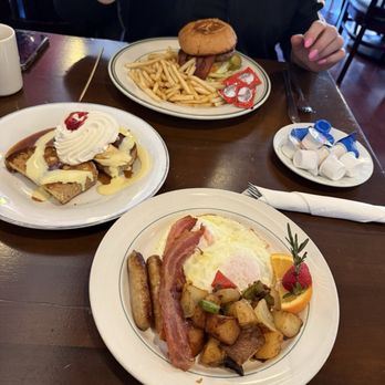 Le Rendez-Vous Cafe - Too, Wife's blue cheese burger Middle , Stuffed French toast Bottom, eggs, potatoes and bacon.sausage - Diners Near Me - Lake Elsinore, California Le Rendez-Vous Cafe - Too, Wife's blue cheese burger Middle , Stuffed French toast Bottom, eggs, potatoes and bacon.sausage - Diners Near Me - Lake Elsinore, California