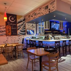 Tsukiyomi Sushi - Dining room and bar seating with sushi chef