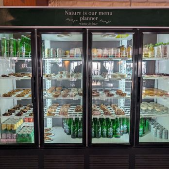 Casa De Luz - Refrigerator full of desserts and cold beverages - Vegan Near Me - Austin, Texas