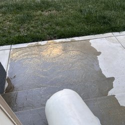 All Dry And Tidy - Draining a barrel of water captured by our drying equipment . This is moisture extracted from the inside of the home that was wet inside!