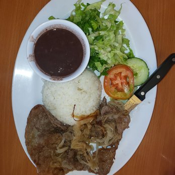 Sol Cubano - Steak and Onions, white rice, beans and green salad. - Cuban Near Me - North Highlands, California Sol Cubano - Steak and Onions, white rice, beans and green salad. - Cuban Near Me - North Highlands, California
