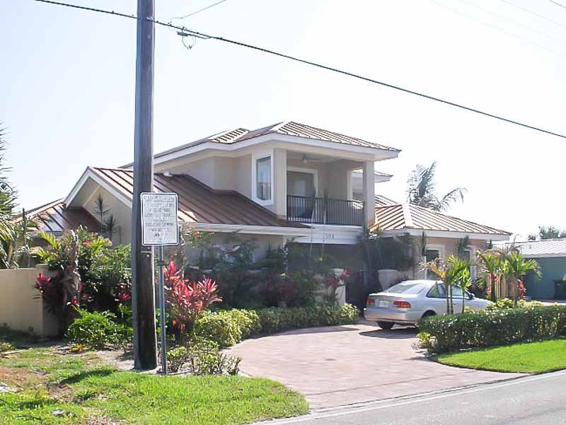 Slide of AKVM Roofing