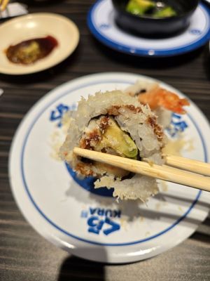 Kura Revolving Sushi Bar by null