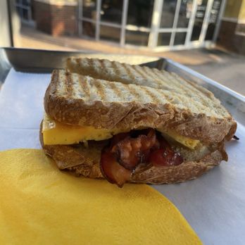 Sunflour Baking Company - #4 Egg, Bacon & Cheddar Sandwich - Bakeries Near Me - Charlotte, North Carolina Sunflour Baking Company - #4 Egg, Bacon & Cheddar Sandwich - Bakeries Near Me - Charlotte, North Carolina