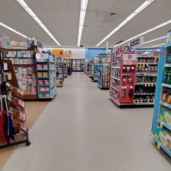 Walgreens - a wide aisle of products in a store - Drugstores Near Me - Saint Cloud, Florida