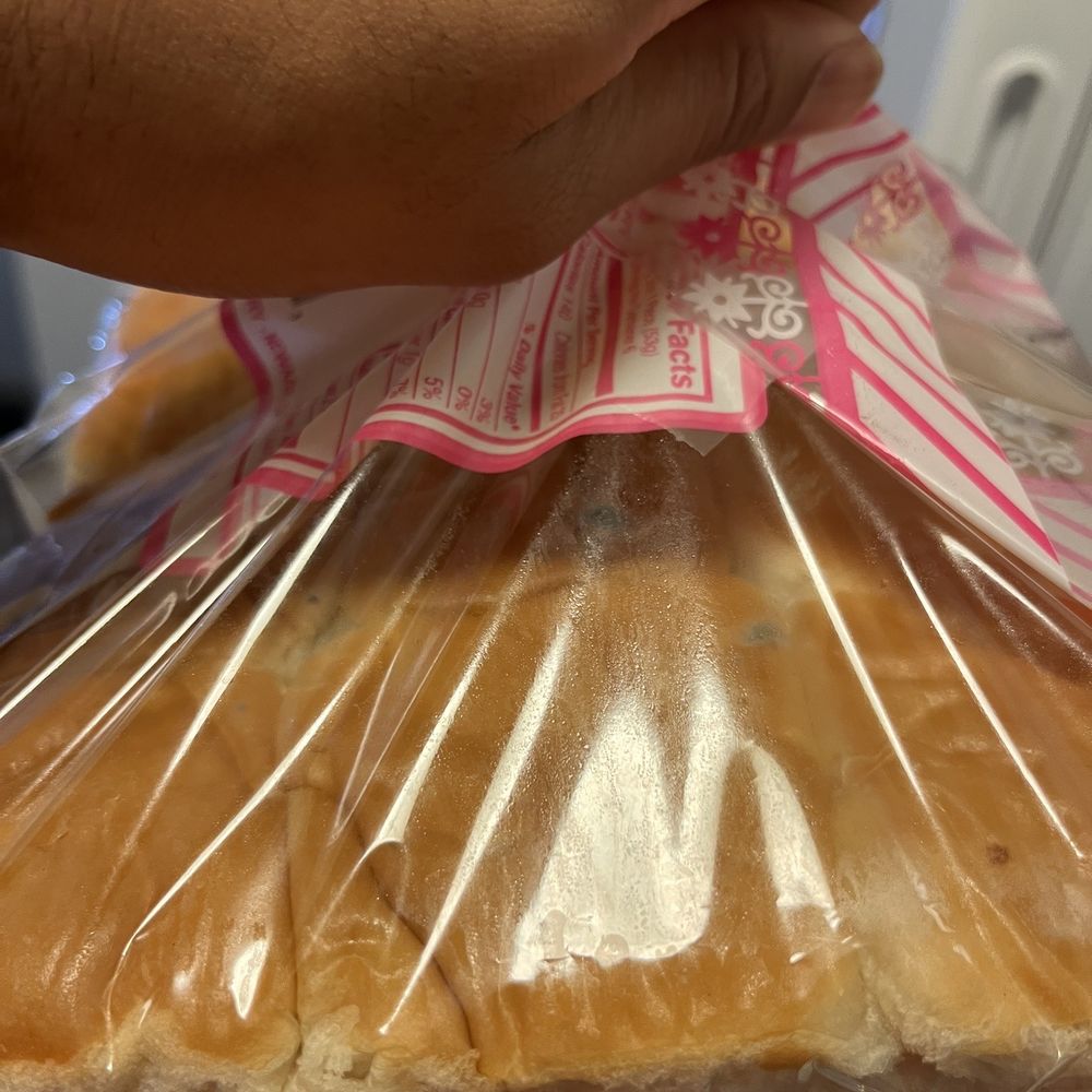 Bharat Bazar - a person holding a bag of bread - Grocery Near Me - Union City, California Bharat Bazar - a person holding a bag of bread - Grocery Near Me - Union City, California