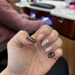 Tony Nails - This so far my favorite Nails , Cindy pick the colors. Absolutely love them.