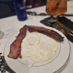 Michael's Restaurant - Eggs fried medium with bacon