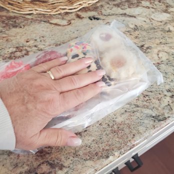 Carlo's Bakery - Cookie package with my gand to depict how small. - Bakeries Near Me - Hoboken, New Jersey