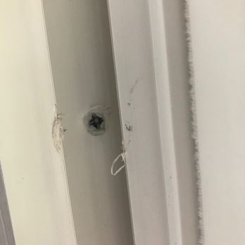 Storm Tight Windows - all the screws were put in with the wrong bit so it ate up all the plastic around them - Windows Installation Near Me - Deerfield Beach, Florida Storm Tight Windows - all the screws were put in with the wrong bit so it ate up all the plastic around them - Windows Installation Near Me - Deerfield Beach, Florida