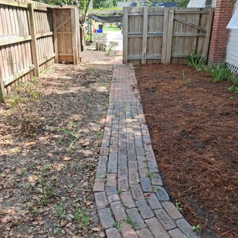 Arbor Conscious Tree Service - On the left is the before. Mostly sand. On the right is the beginnings of the layer of the beautiful mulch. They laid down the rich compost - Tree Services Near Me Arbor Conscious Tree Service - On the left is the before. Mostly sand. On the right is the beginnings of the layer of the beautiful mulch. They laid down the rich compost - Tree Services Near Me