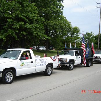 Sweeney's Custom Landscaping - a line of trucks - Landscaping Near Me - Villa Park, Illinois