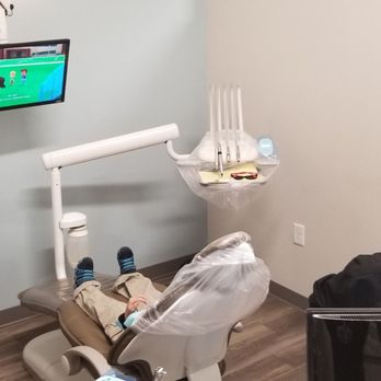 Cardinal Family Dentistry - Exam area with tv for kids - General Dentistry Near Me - Apex, North Carolina Cardinal Family Dentistry - Exam area with tv for kids - General Dentistry Near Me - Apex, North Carolina
