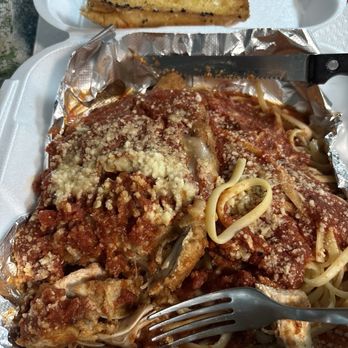 Dead Bob's - This is the Thursday nite special chicken Parmesan over pasta with garlic bread - American Near Me - St. Petersburg, Florida Dead Bob's - This is the Thursday nite special chicken Parmesan over pasta with garlic bread - American Near Me - St. Petersburg, Florida