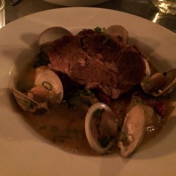 Satis Bistro - Slow Roasted Berkshire Pork Shoulder, Littleneck Clams, Linguica, Potato and Kale, Saffron Broth - Wine Bars Near Me - Jersey City, New Jersey Satis Bistro - Slow Roasted Berkshire Pork Shoulder, Littleneck Clams, Linguica, Potato and Kale, Saffron Broth - Wine Bars Near Me - Jersey City, New Jersey