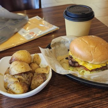 Dengeos - Charbroiled cheese burger with grilled onions, "Grecian potatoes "and a coffee. - Greek Near Me - Buffalo Grove, Illinois