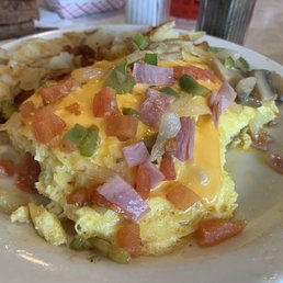 Omelette,notice the yellow "substance" it's soaking in ....have not clue what it was other than nasty. Omelette,notice the yellow "substance" it's soaking in ....have not clue what it was other than nasty.