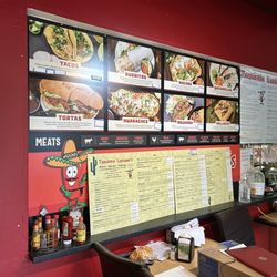 Taqueria Lucianos - Menu board on the wall